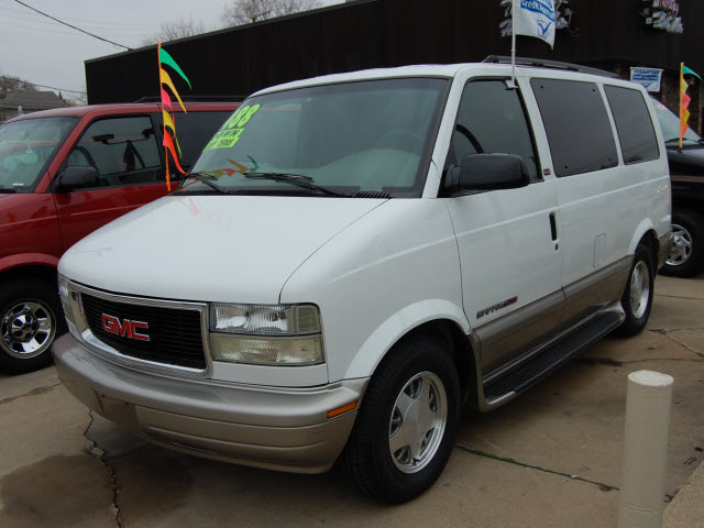white gmc safari van