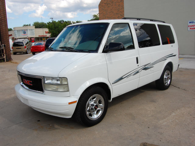 white gmc safari van